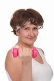 Portrait of senior woman with dumbells