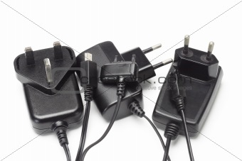 Assorted mobile phone chargers and adapters