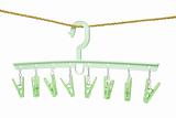 Plastic clothes hanger with hanging pegs