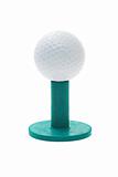 Golf ball on green rubber tee 