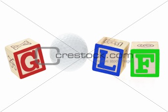 Golf ball and alphabet blocks