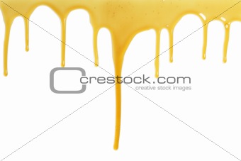 honey flows over a white background