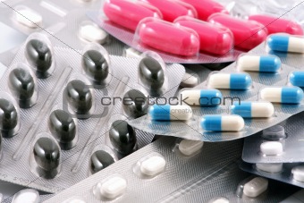 Pills of many shapes and colors