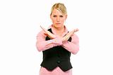 Authoritative modern business woman with crossed arms. Forbidden gesture
