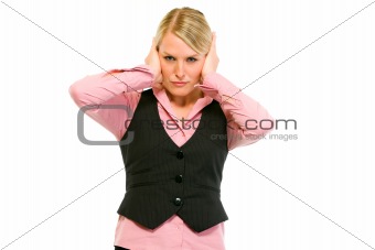 Modern business woman making hear no evil gesture
