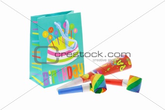Colorful gift bag and party blowers