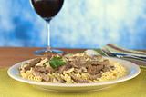 Veal Strips with Mushrooms on Pasta