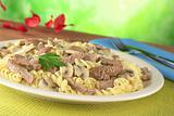 Veal Strips with Mushrooms on Pasta