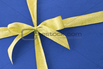 Bow ribbon on blue gift box