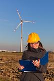 Female Engineer in Wind Turbine Power Generator Station