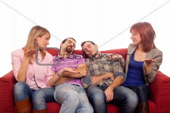 Girls Laughing while Boys Sleep on Sofa