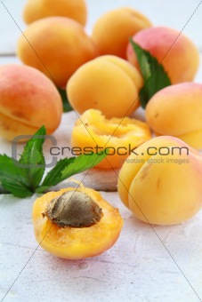 Group fruit apricot on a white table