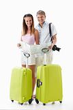 Attractive couple with suitcases