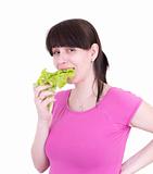 The young woman is green salad