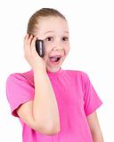 The beautiful girl with astonishment speaks on the phone