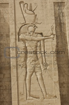 Hieroglyphic carvings on an Egyptian temple wall