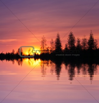 Lake at sunset with reflection