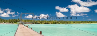 jetty over turquoise ocean 