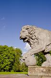 vintage lion sculpture in the old park