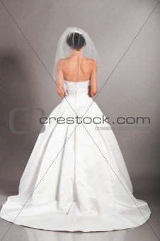 beautiful bride on grey background
