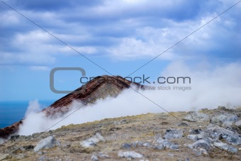 Grand Crater in the sulphur smoke, island Volcano, Lipari Island