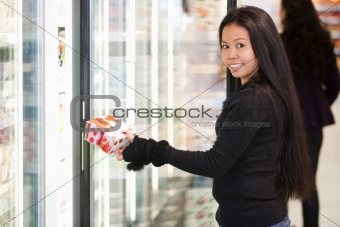 Woman Buying Yogurt