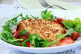 salad with fried cheese, arugula and fresh vegetables