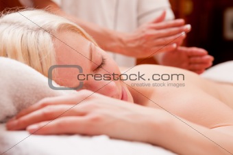 Woman Receiving Percussive Massage
