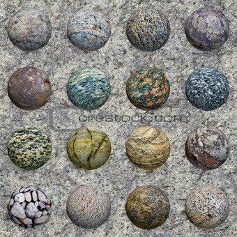 Set of stone balls on granite wall - seamless texture