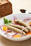 cooked bavarian sausages in a soup