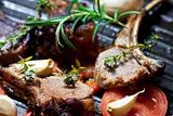 roasted lamb chop in a pan with vegetables