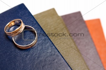 Wedding rings on book