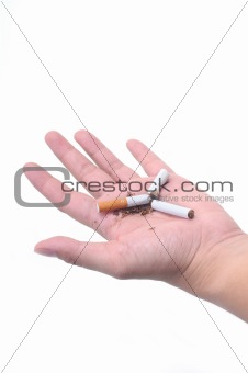 Hand holding a broken cigarette