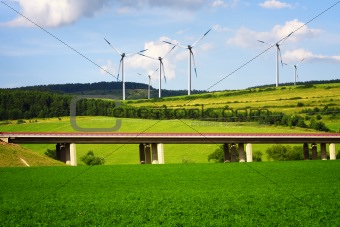 Wind turbines over the highway