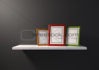 Bookshelf with an empty photo frame