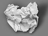 Crumpled White paper on Gray