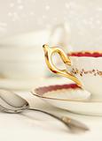 Closeup of a tea cup and spoon
