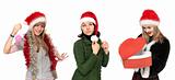 Three girls in Christmas hat with gift
