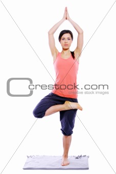 Young and beautiful girl doing yoga exercises