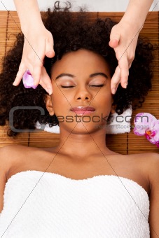 Facial temple massage in beauty spa