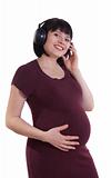 Pregnant woman listening to music.