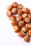 hazelnuts lined with a heart on a white background