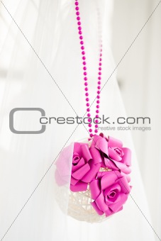 Bridal decoration of sphere with pink flowers