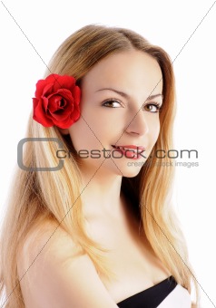 Beautiful girl with flower in her hair