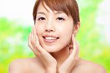 Beautiful woman face with skin care concept