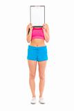  Fitness girl holding blank clipboard in front of her face
