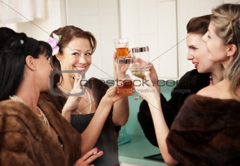 Happy Housewives Drink in the Kitchen