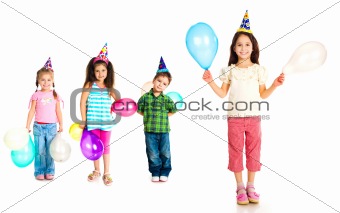Kids in birthday caps