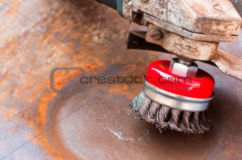 wire brush for cleaning rust off metal surface