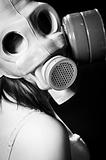 Girl wearing gasmask and white lingerie in black and white